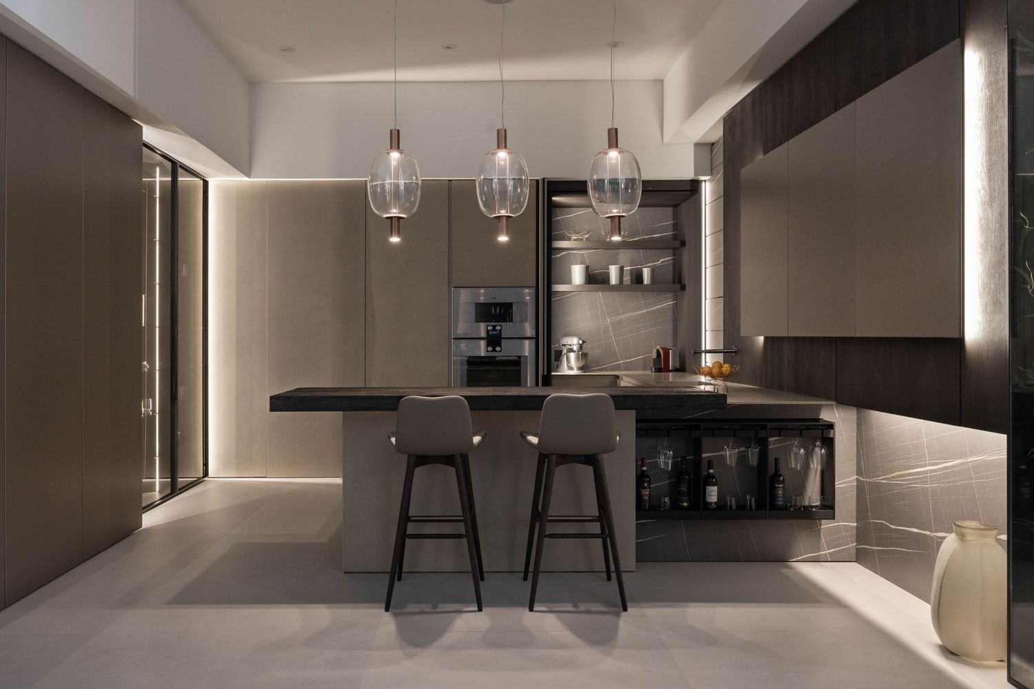 Elegant kitchen space with integrated appliances and minimalist design elements in neutral tones.