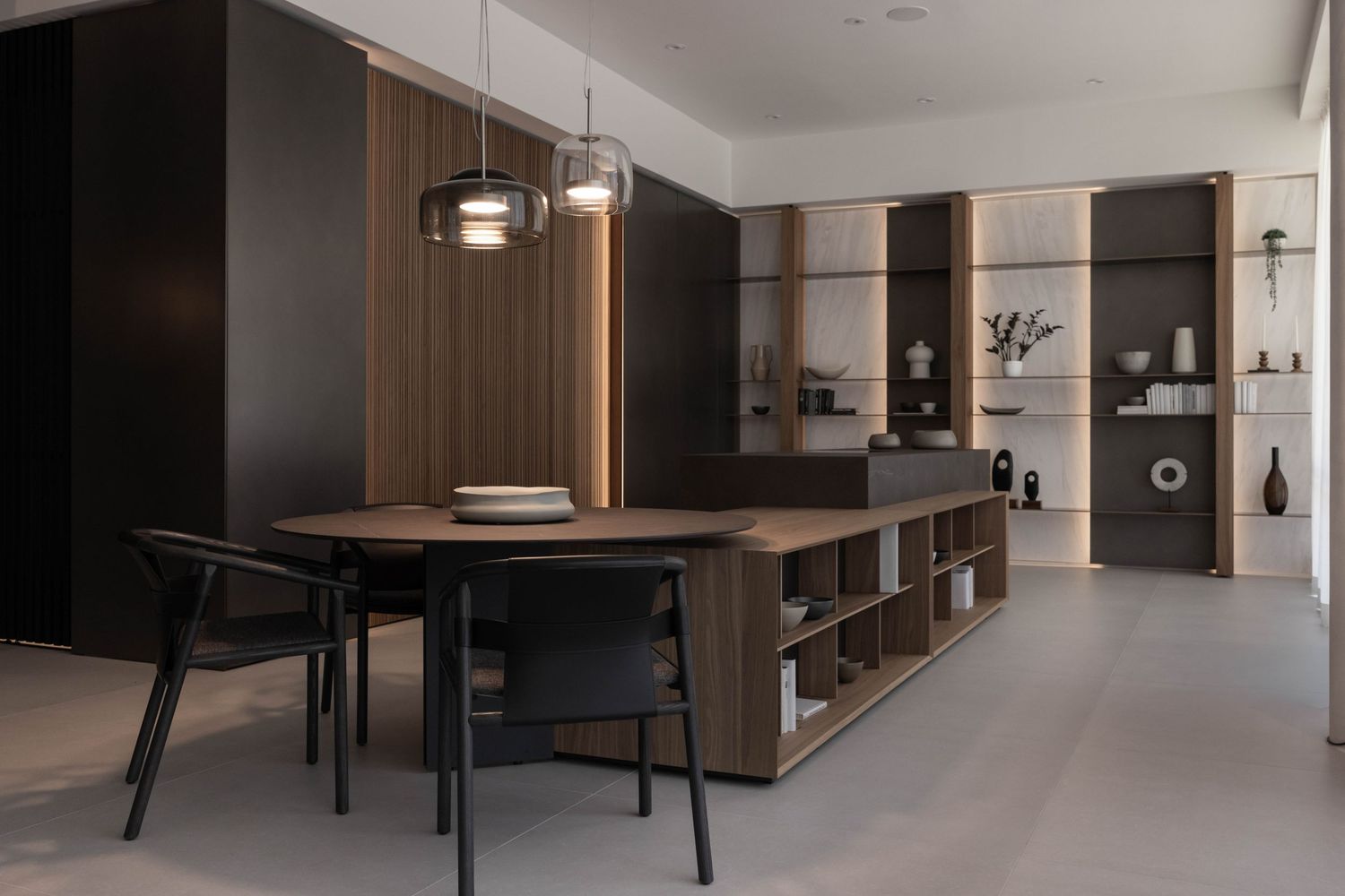 Contemporary open-concept living space with wooden accents and minimalist black furniture.