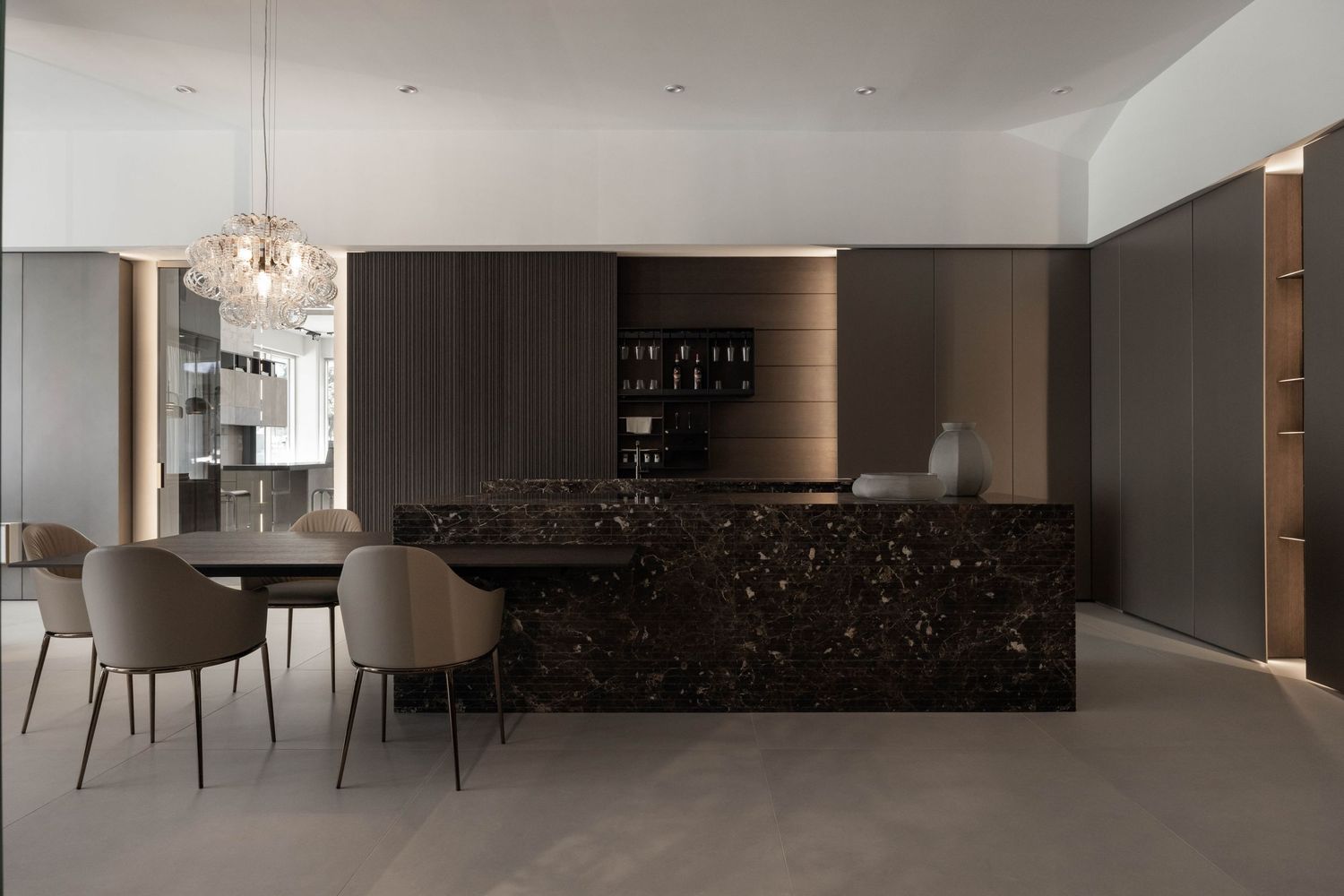Luxurious open-plan living space with modern kitchen and dining area featuring city views.