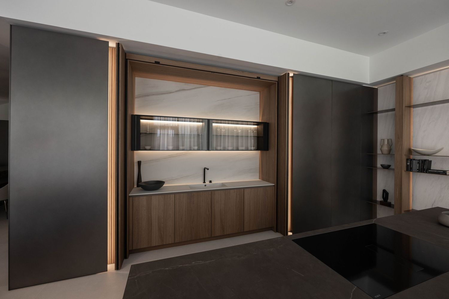 Panoramic view of contemporary living space with dark walls and wooden accents.