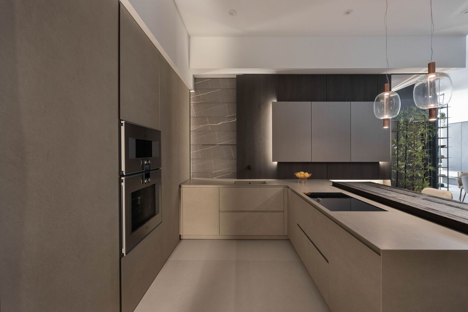 Minimalist kitchen design showcasing seamless cabinetry and high-end finishes.