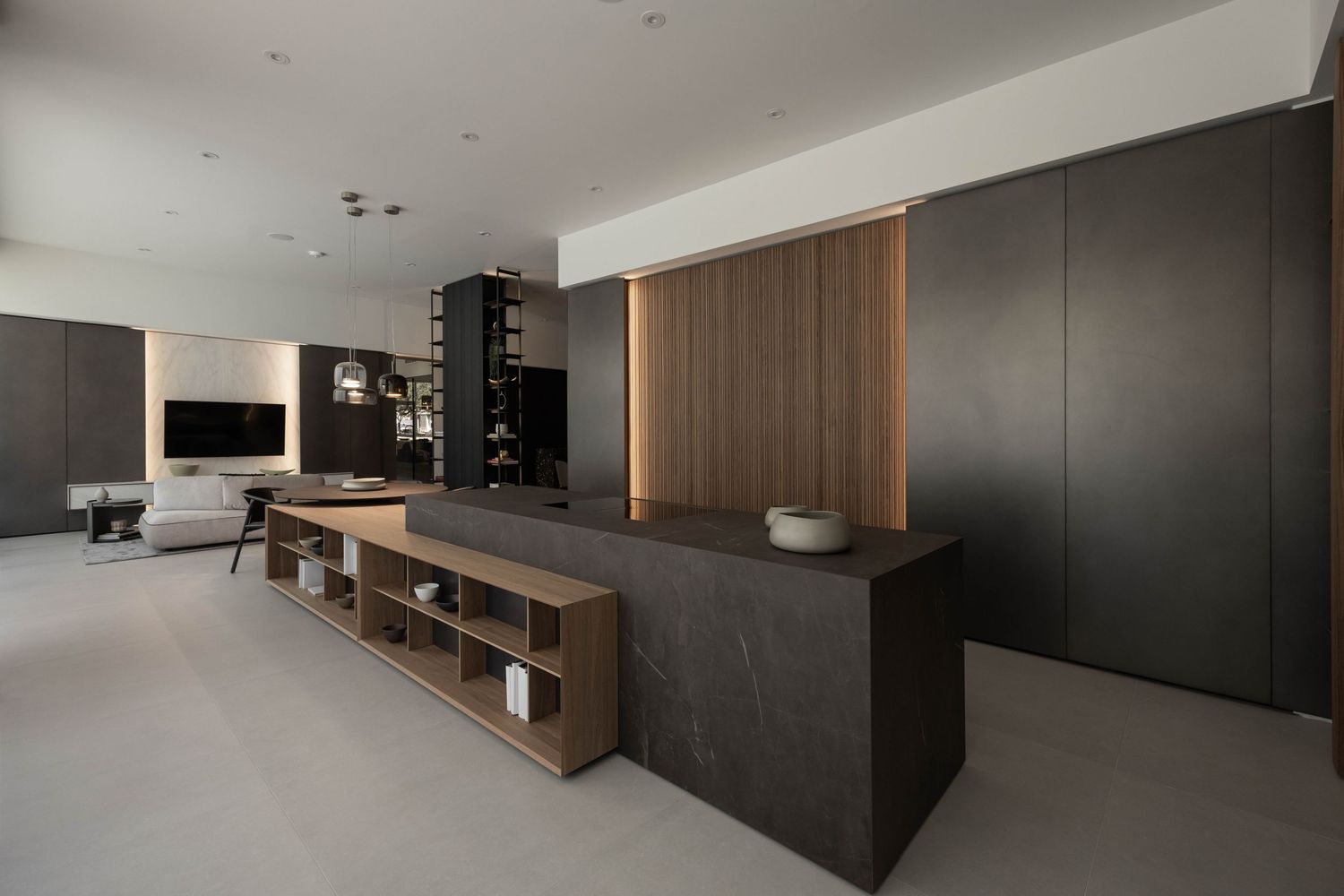 Elegant living area featuring dark accent walls and clean lines in a minimalist design.