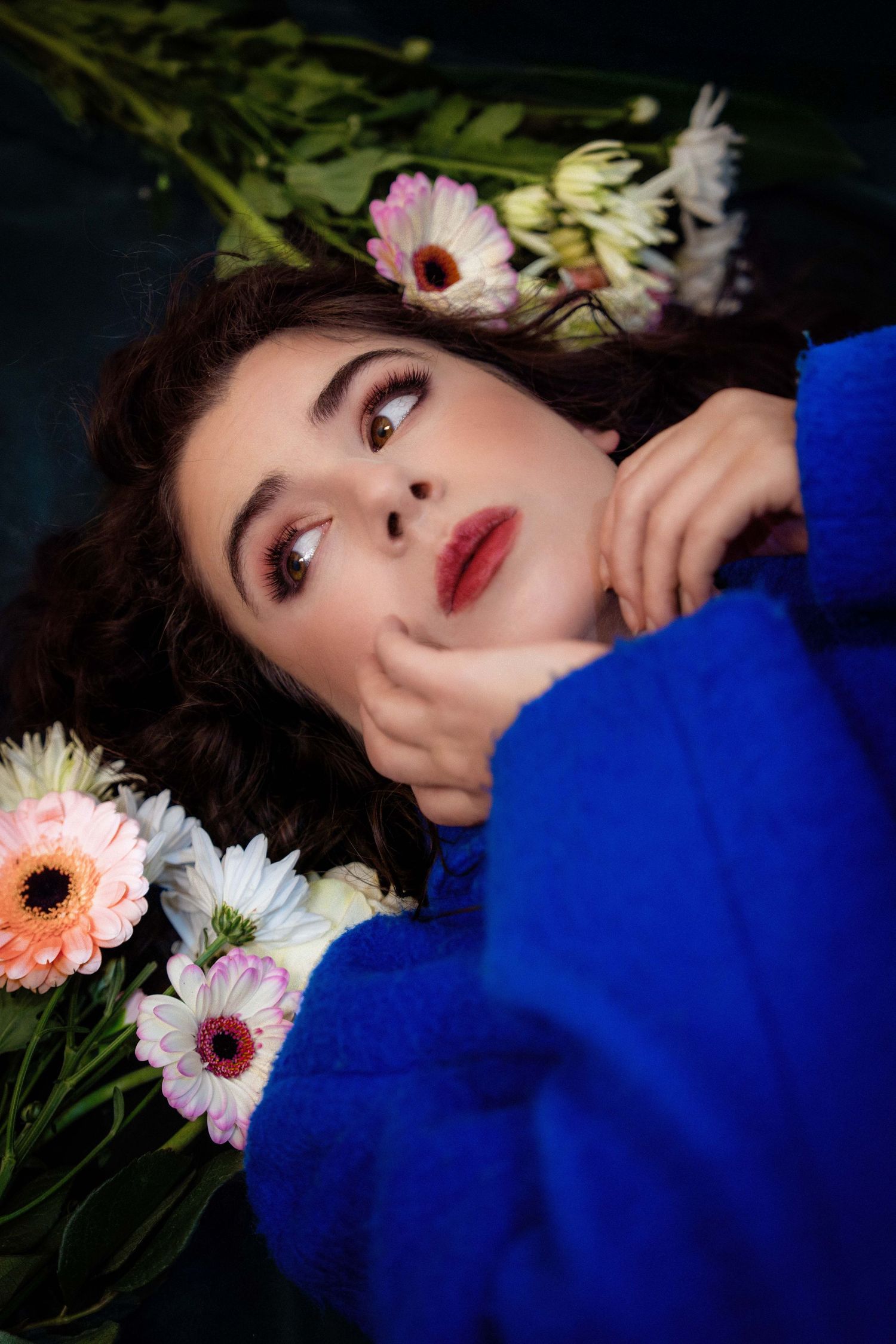 Portrait of a woman in a blue fur jacket in an Antibes Portrait Studio
