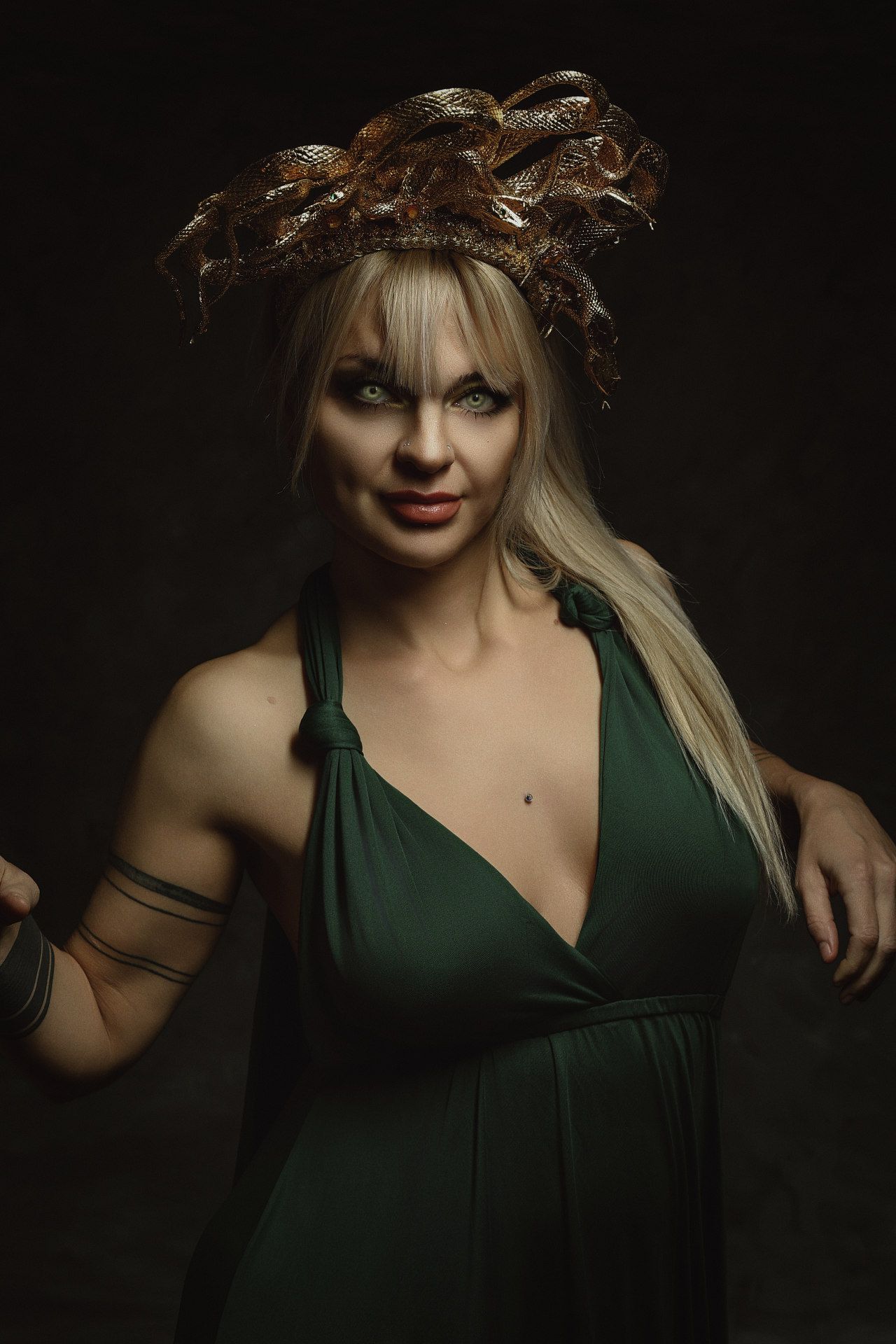 Feel the power of the myth: Your professional photo as Medusa with golden snakes and dramatic studio lighting.