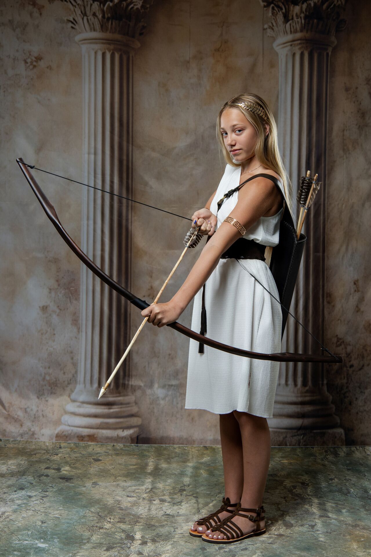 Artemis bachelorette experience in Athens with Ancient Greek costumes, huntress styling and cinematic GreekClick photography.