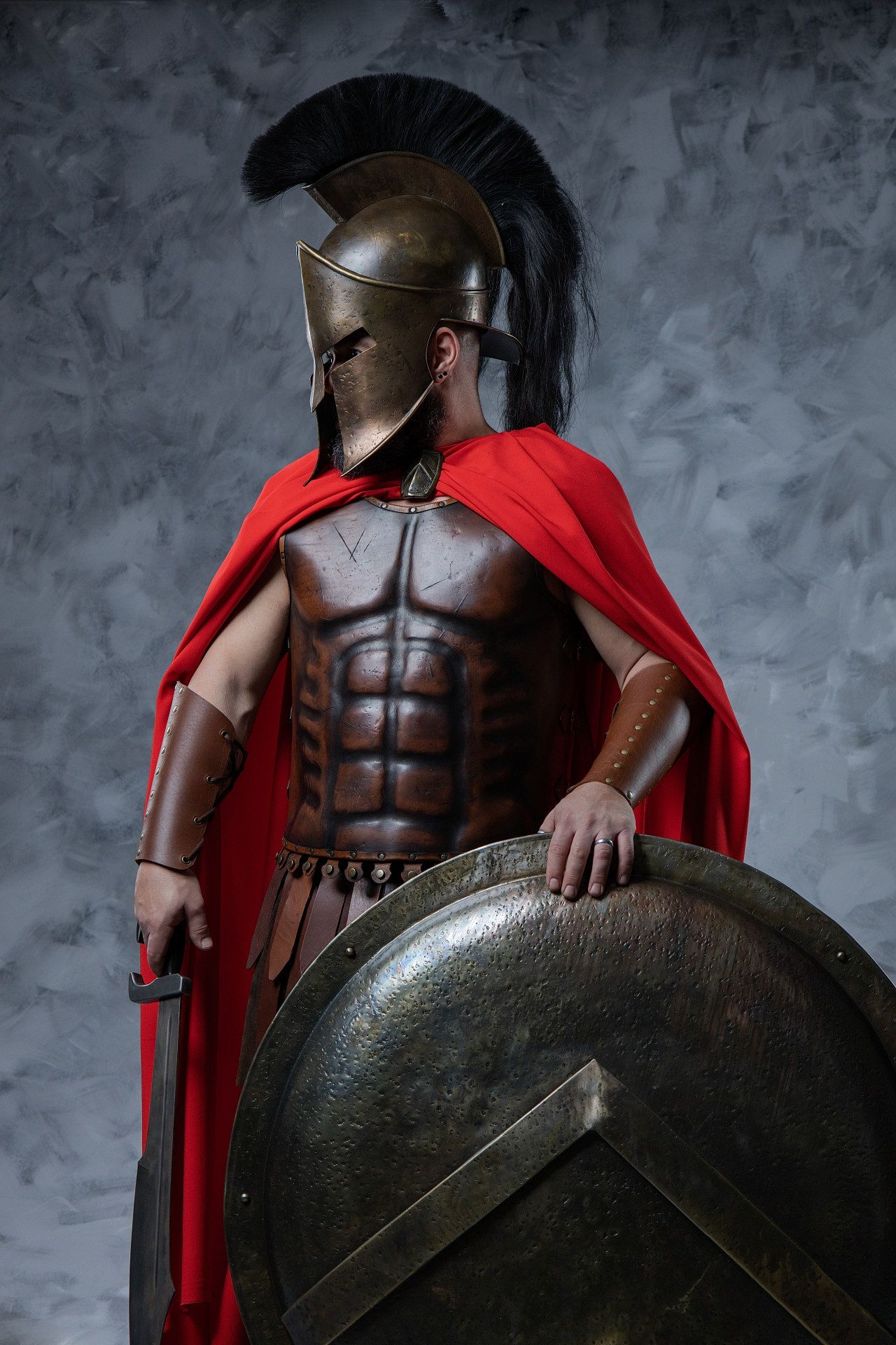 Spartan soldier costume experience in Athens with warrior armor, heroic poses and GreekClick portraits.