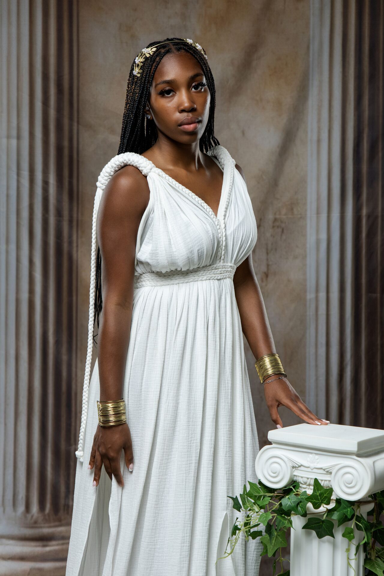 High Priestess Ancient Greek temple photography in Athens with goddess costume, golden details and cinematic GreekClick portraits.