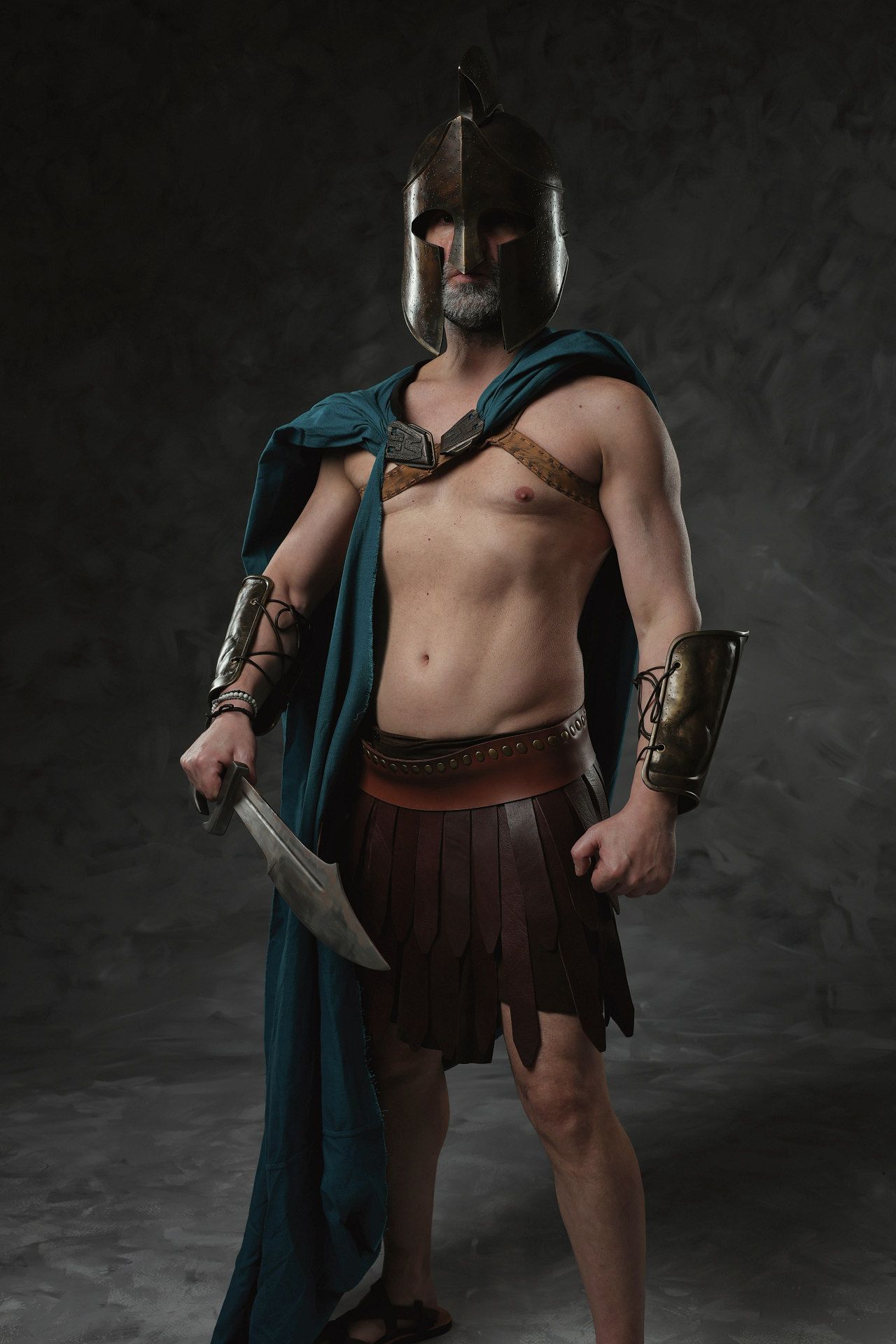 Ancient Greek warrior transformation inspired by Themistoklis with armor styling and GreekClick portraits.