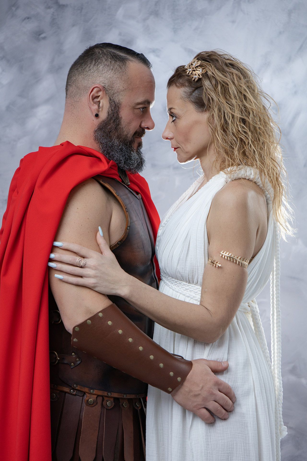 Capture your love in ancient Greek style: A professional studio session for couples visiting Athens.