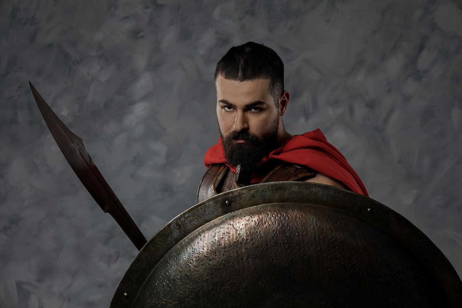 Spartan warrior portrait in Athens with shield, armor and legendary GreekClick historical photography.