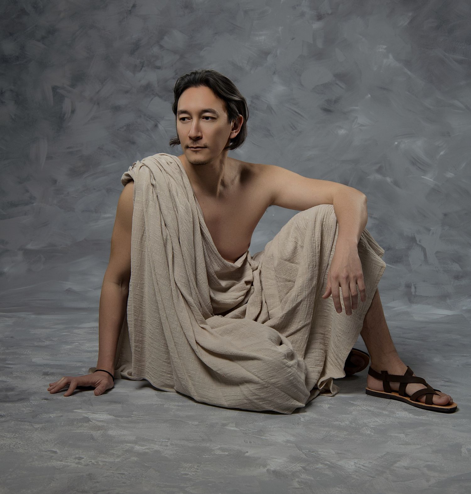 Get photographed as an Athenian philosopher with a scroll and laurel wreath at GreekClick studio near Syntagma.