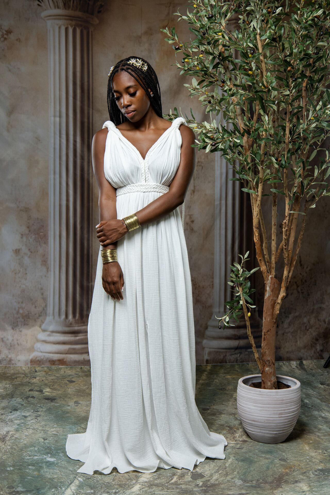 Athens tourist photo experience as a High Priestess with Greek goddess costumes, classical styling and GreekClick portraits.