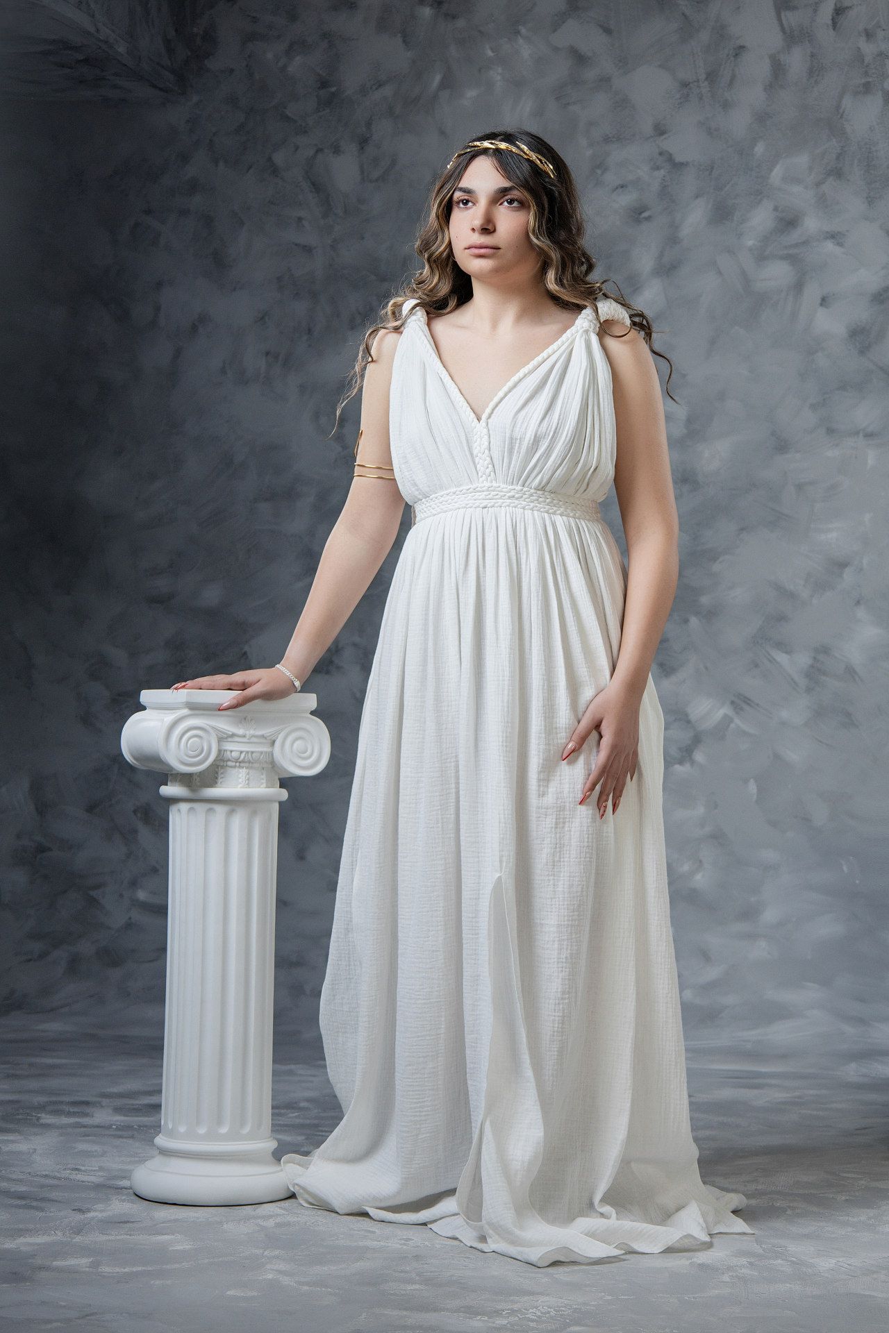 Get photographed as a Hellenic Beauty in Athens wearing a graceful ancient Greek dress and floral crown.
