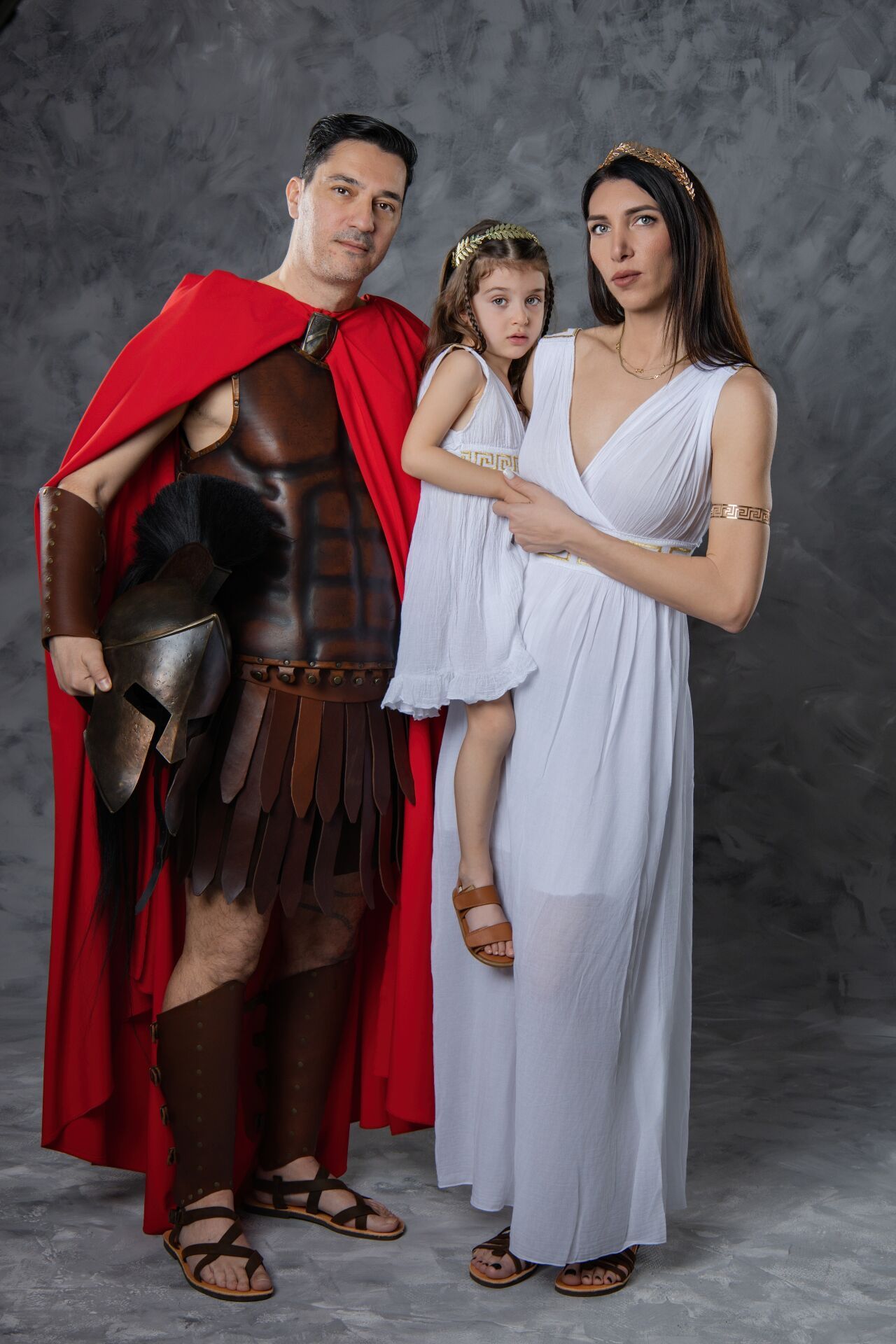 Your professional family photo in Ancient Greek costumes: A unique and fun souvenir from your trip to Greece.