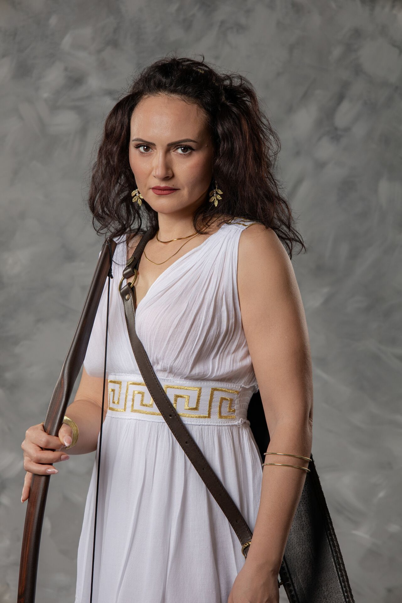 Artemis goddess portrait in Athens with Ancient Greek costume, mythology styling and cinematic GreekClick photography.