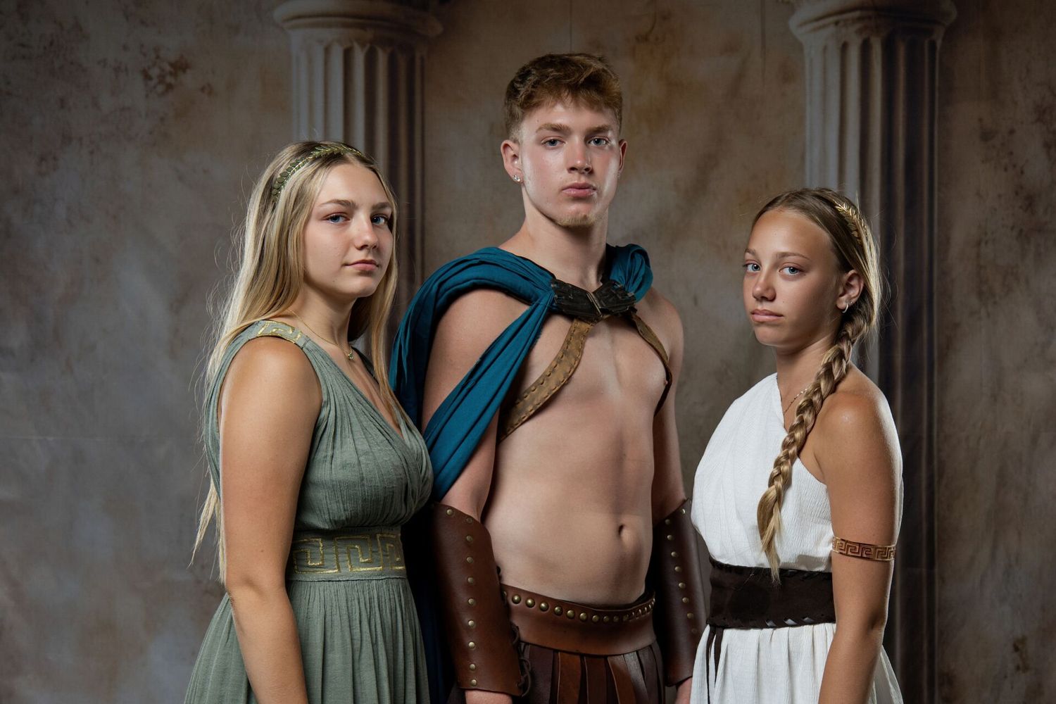 Travel friends Ancient Greek photoshoot in Athens with mythology costumes and unique vacation portraits by GreekClick.