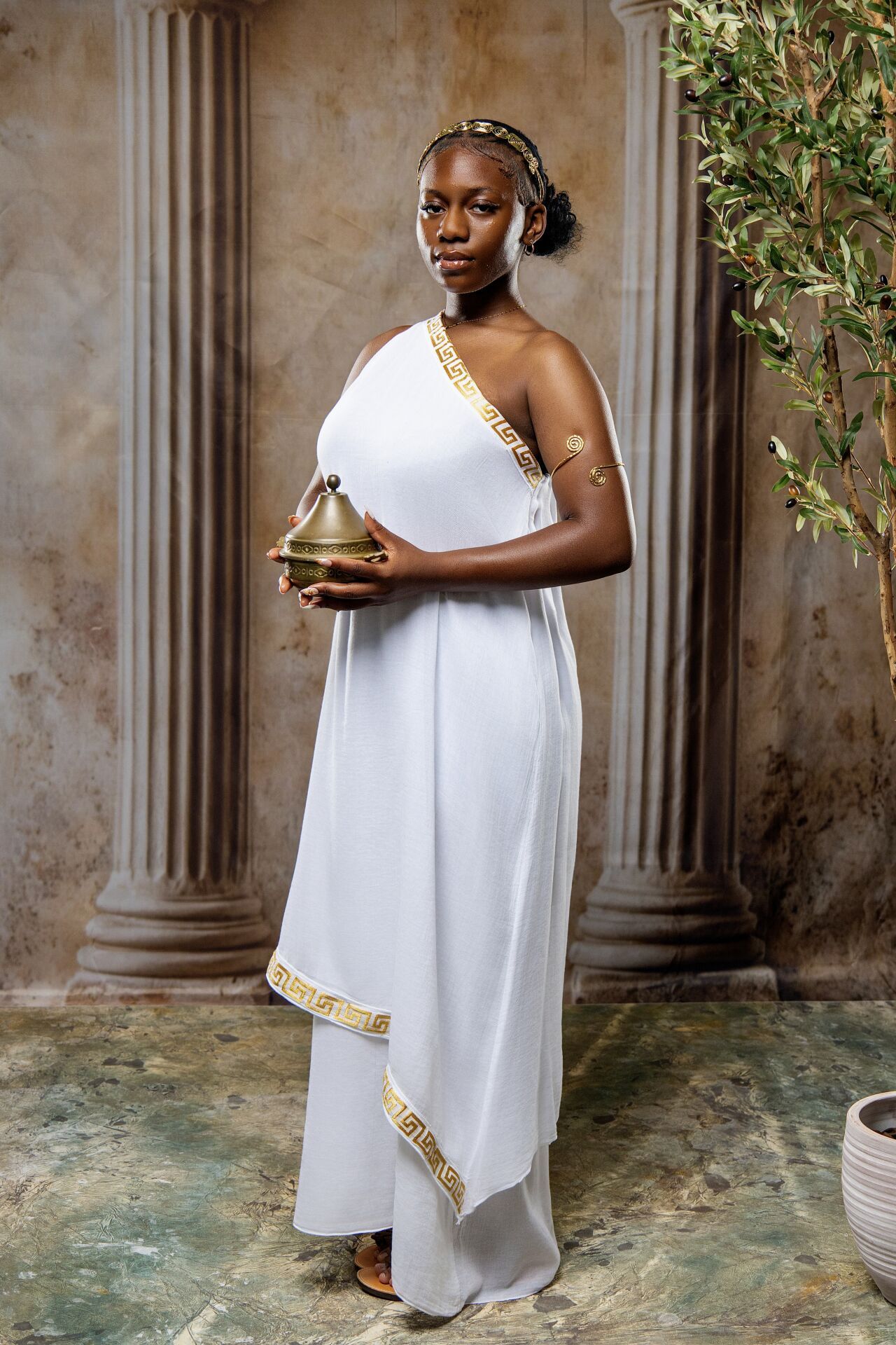 Oracle of Delphi costume photoshoot in Athens with priestess styling and cinematic GreekClick portraits.