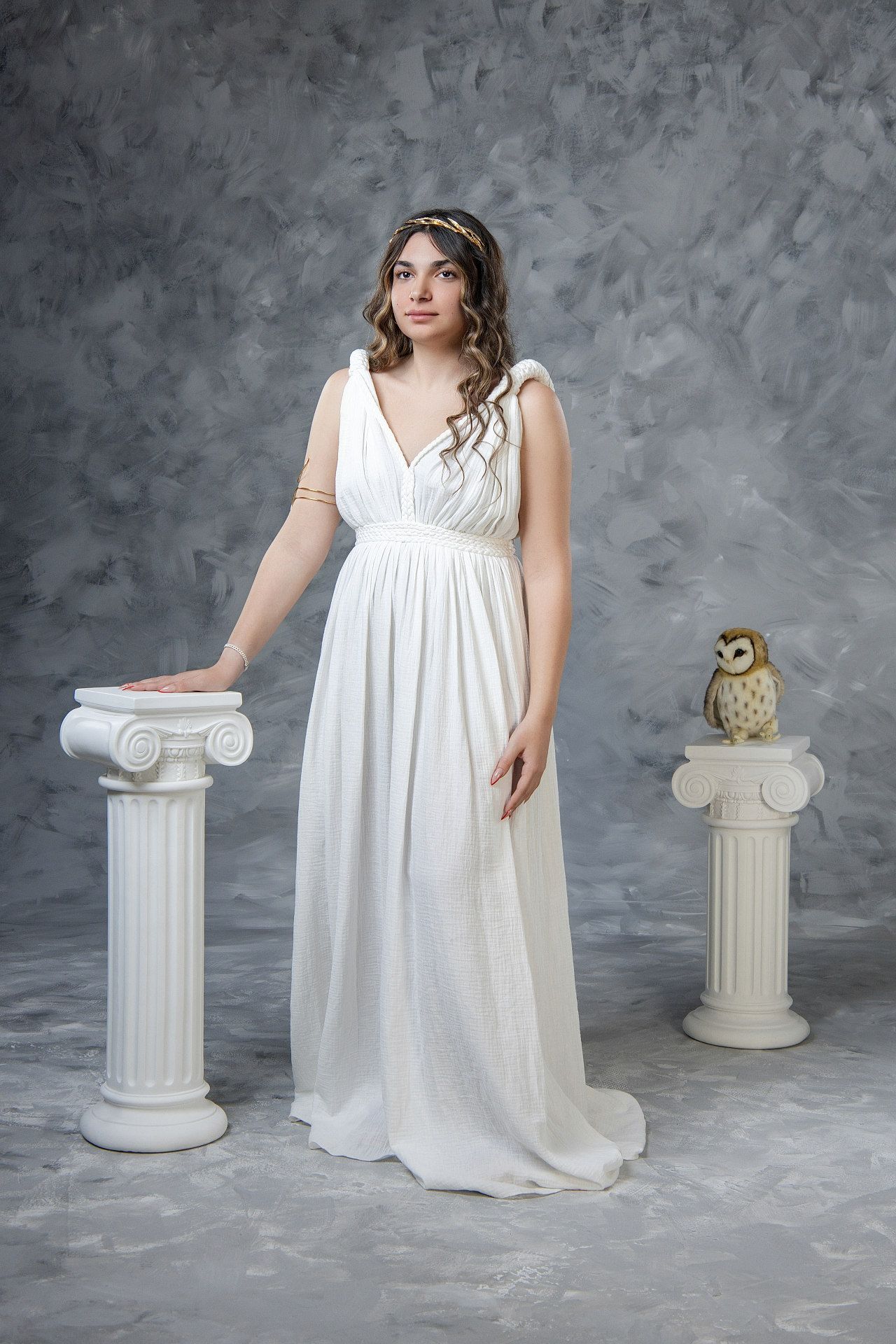 Capture your natural glow while you visit Athens with a professional Hellenic-themed photoshoot.