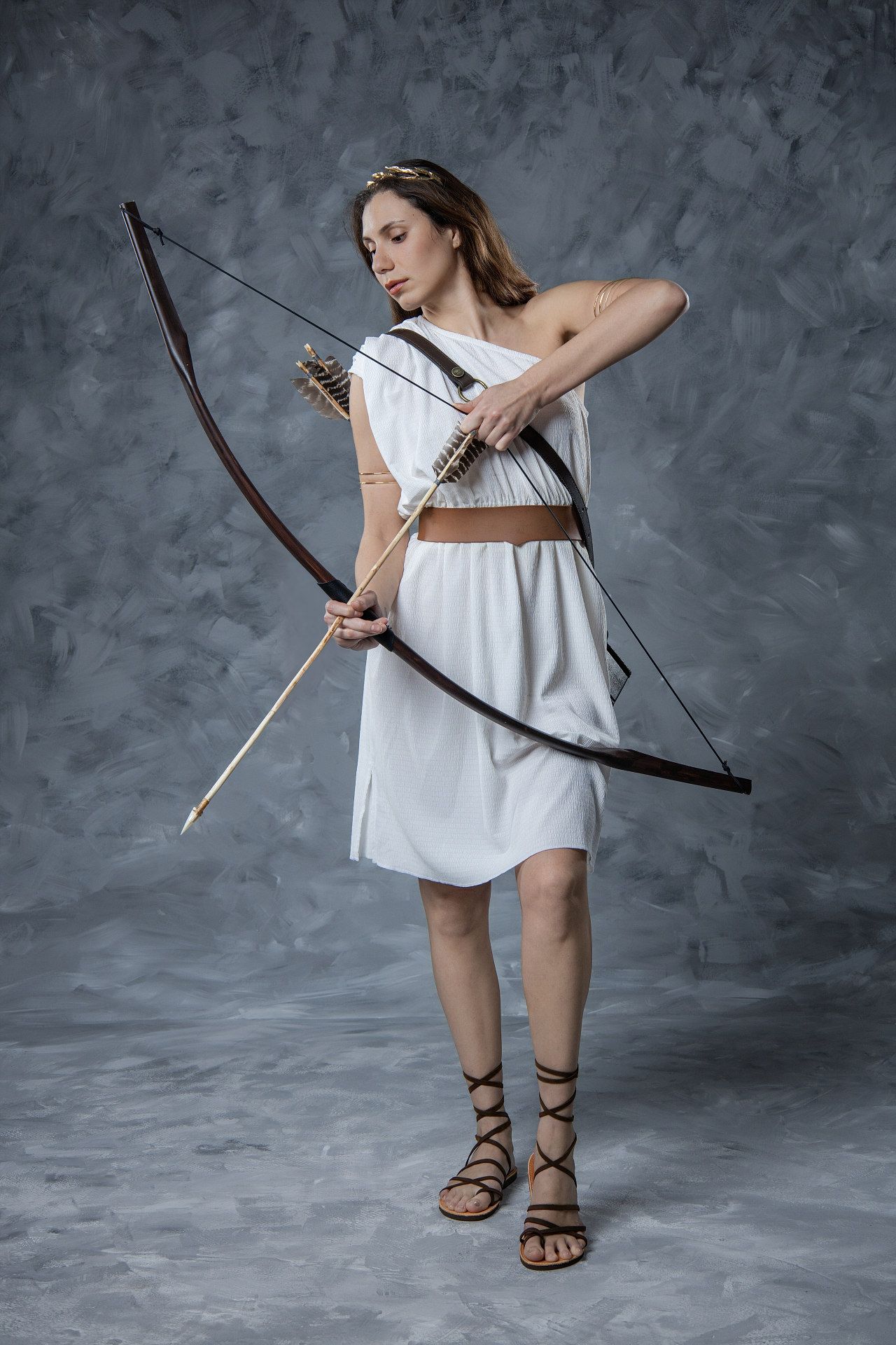 Get photographed as the Goddess Artemis in Athens with an authentic ancient Greek bow and arrow set.