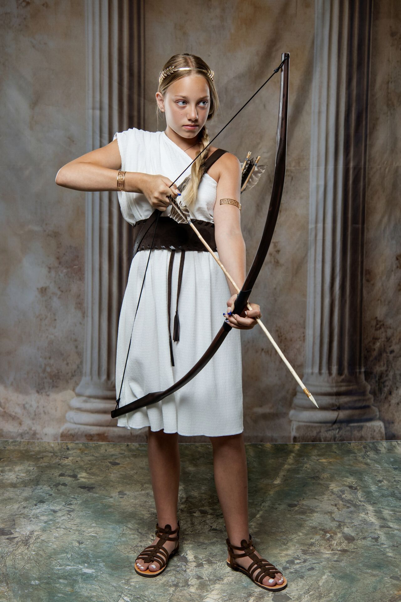 Unique Athens activity as Artemis with Ancient Greek goddess costume and cinematic GreekClick portraits.