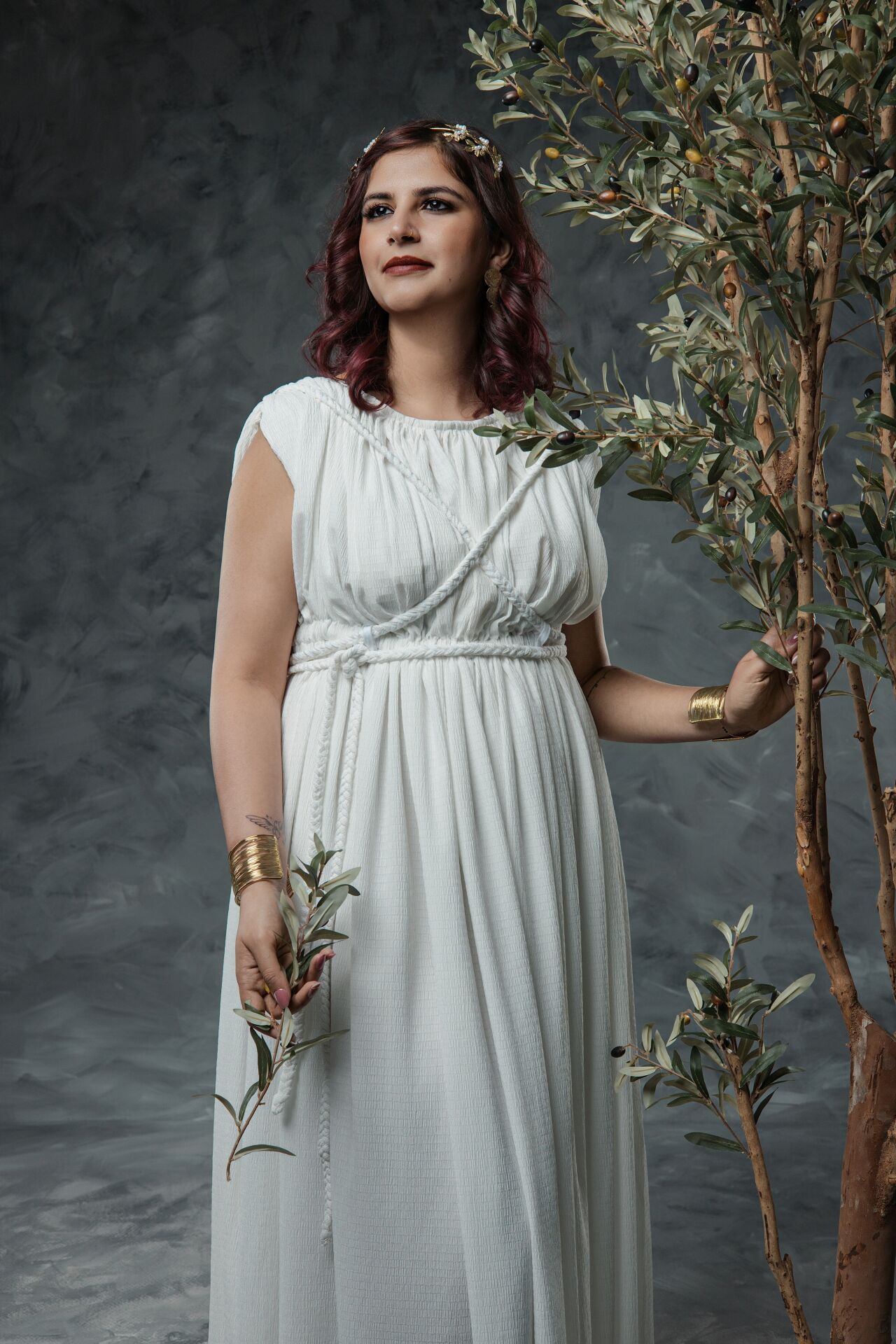 Authentic Greek priestess costume photoshoot in Athens with mythology styling and professional GreekClick studio portraits.