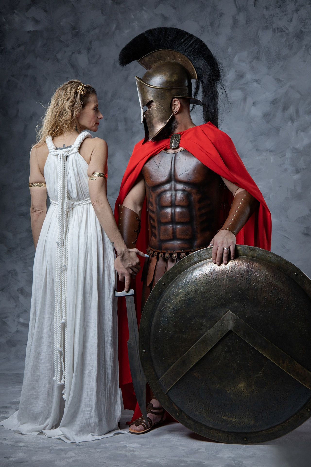 Be an Ancient Greek couple for a day and keep your story alive with an epic studio portrait.