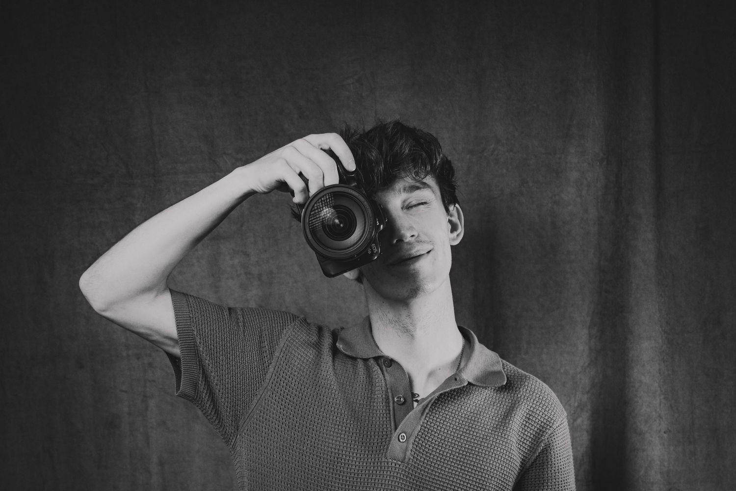 Artistic black and white portrait series showing dramatic poses and movements.