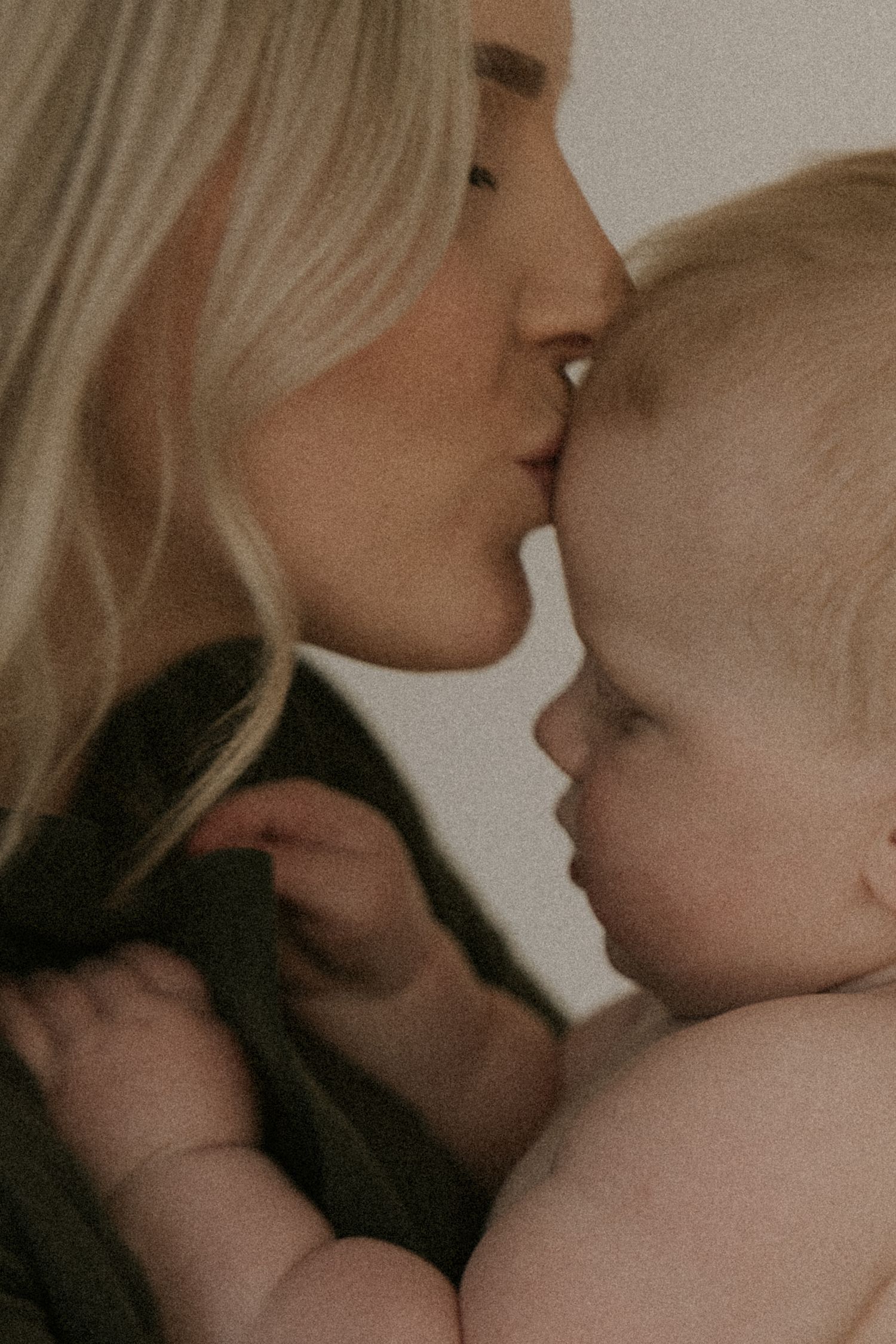 A series of tender moments between parent and child showing affectionate kisses and bonding.
