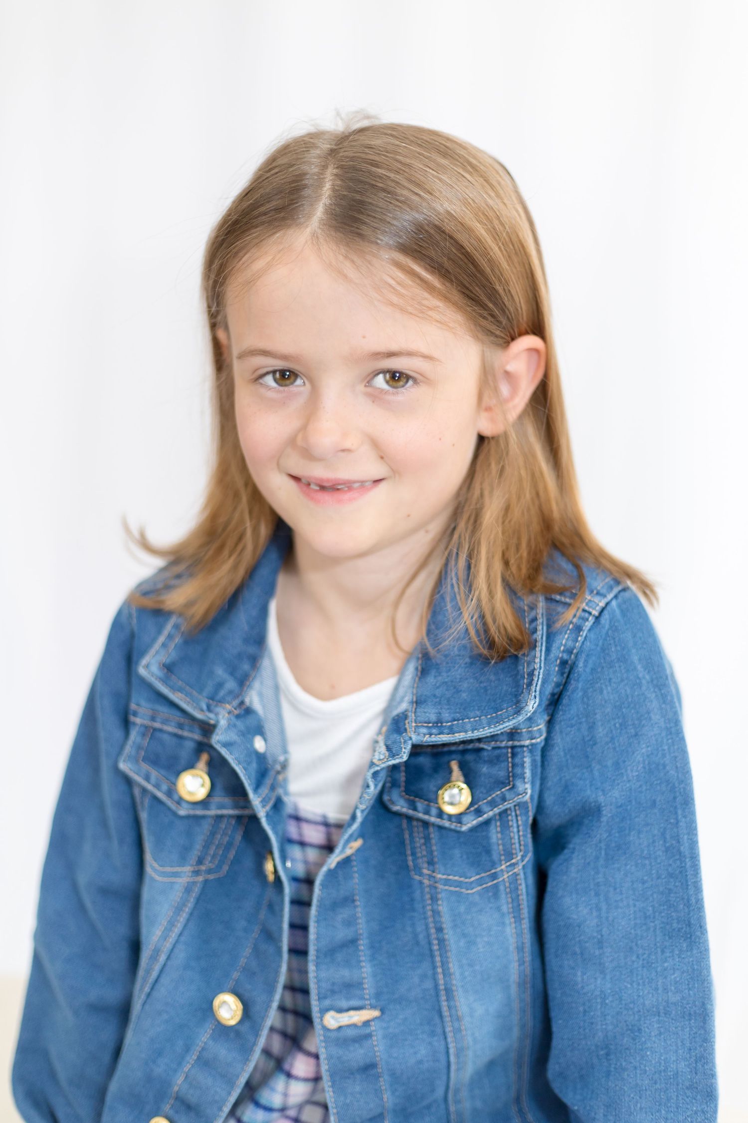 Multiple poses in denim jacket showing playful expressions against white background.