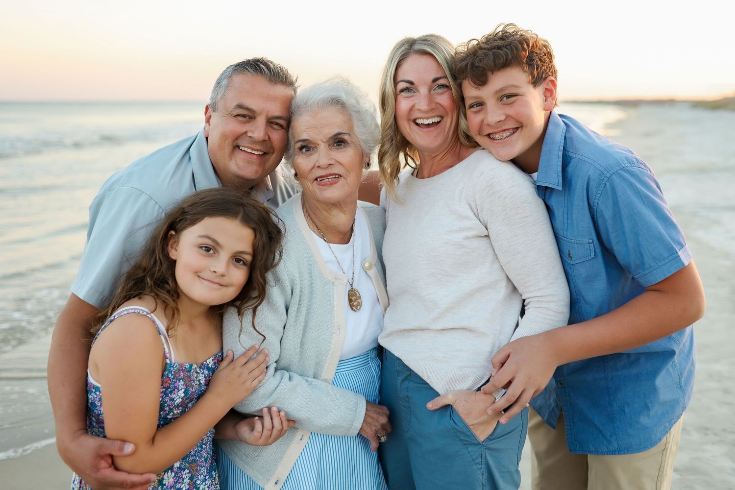 Hilton Head family photography session with grandparents at Folly Field Beach, capturing a joyful multi-generation moment