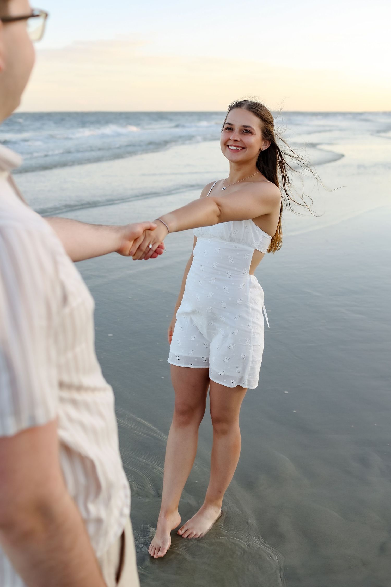 Engagement photos at Sea Pines Beach Club on Hilton Head Island following surprise proposal at sunset
