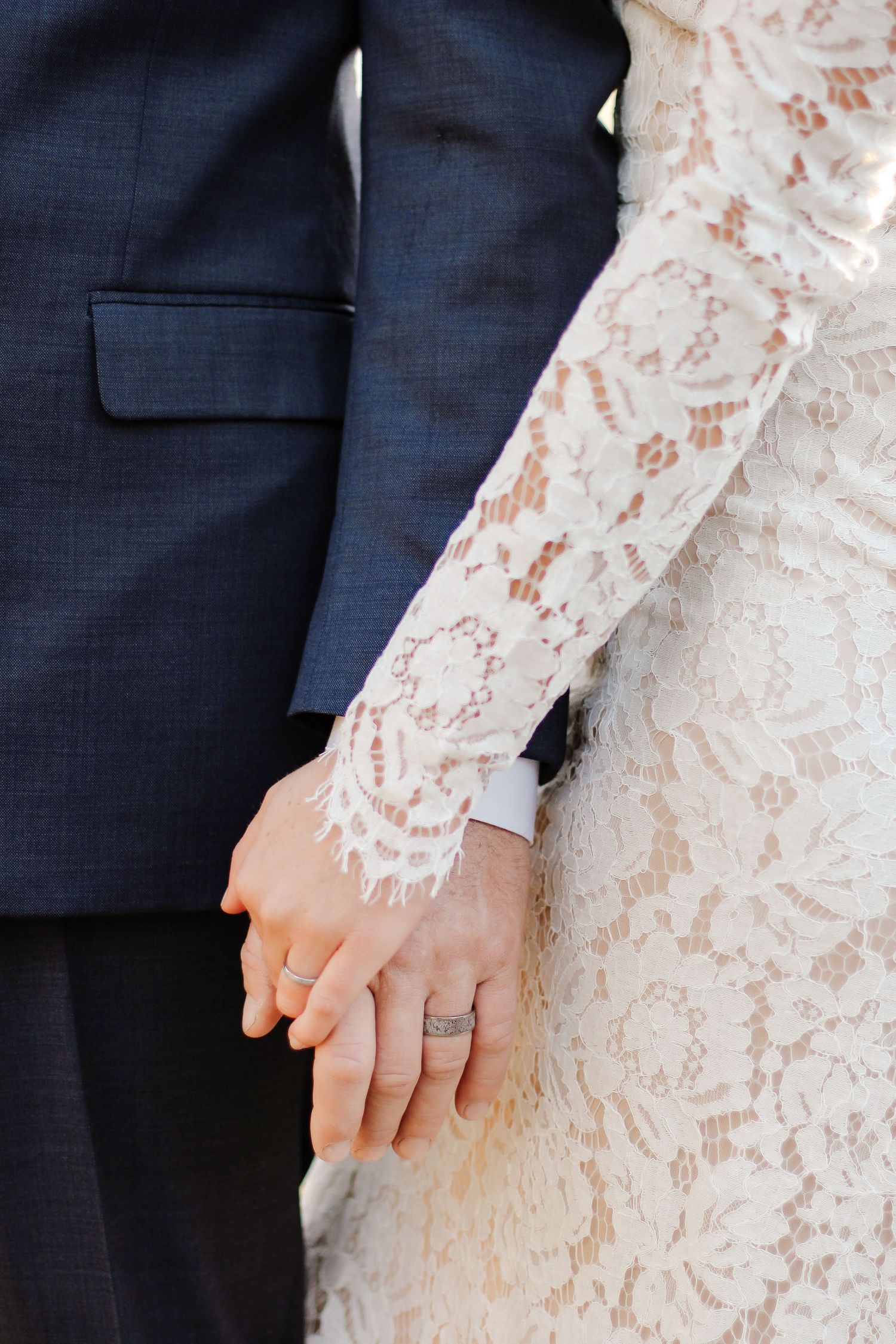 Close-up of bride and groom’s hands with wedding rings during Hilton Head elopement photography
