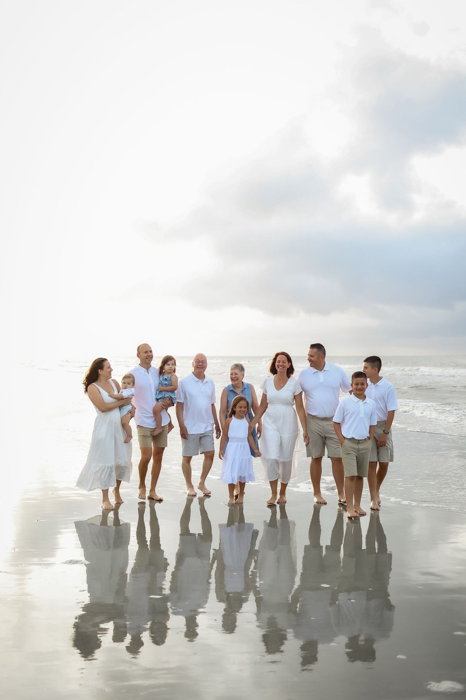 Extended family photography on Hilton Head Island with large family walking together along South Forest Beach shoreline
