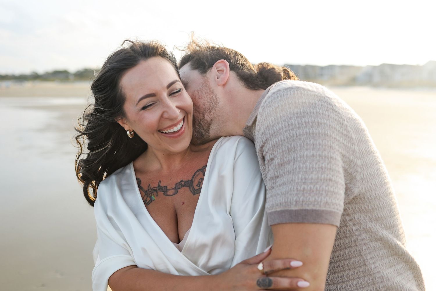 Couples photo session at sunset on Singleton Beach, Hilton Head Island with ocean backdrop