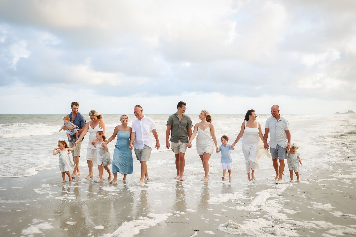 Extended family beach photography on Hilton Head Island at Sea Pines Beach Club, capturing joyful connection and walking in the waves