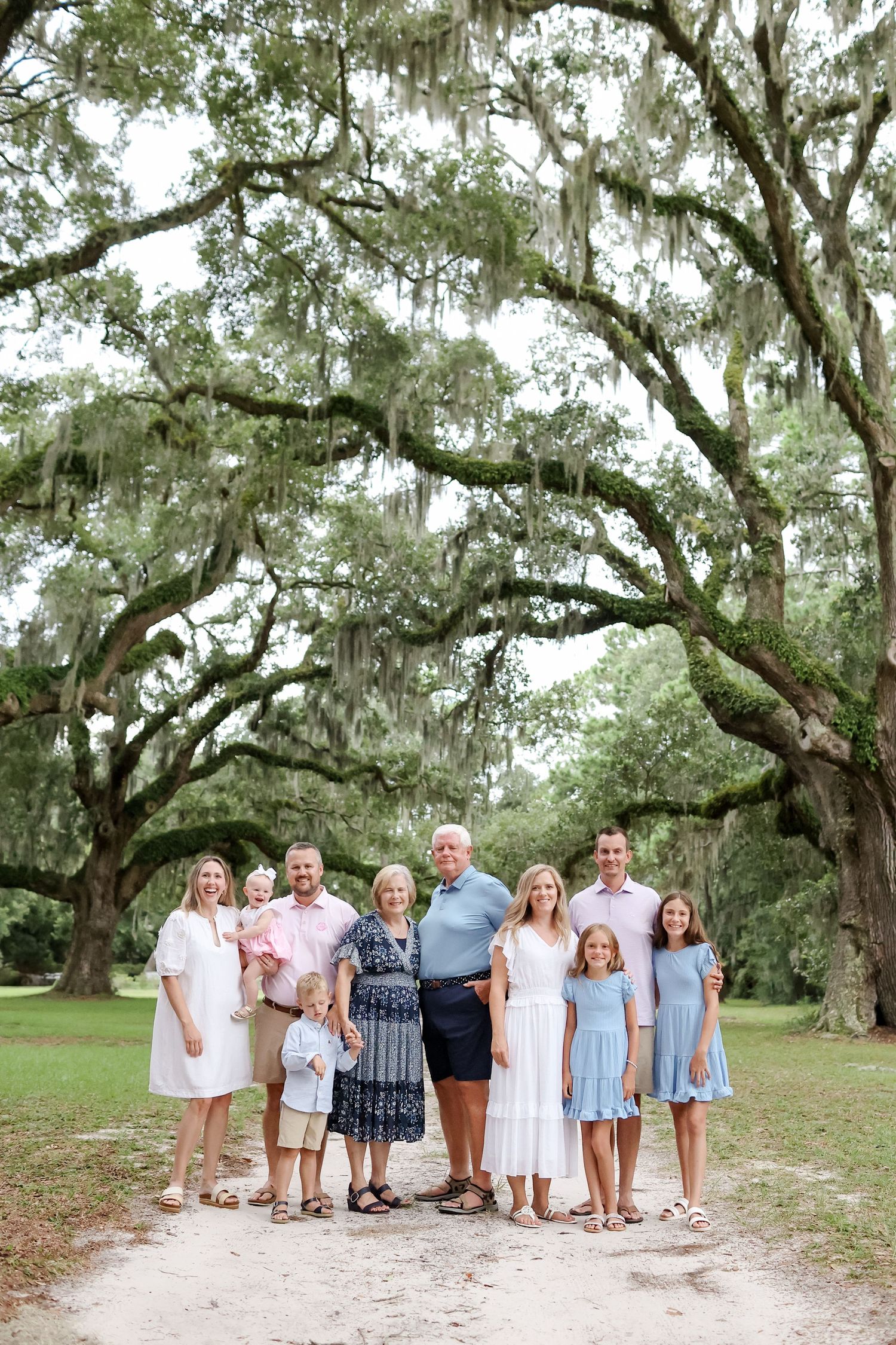 Extended family reunion portraits under live oak trees with Spanish moss in Sea Pines on Hilton Head Island