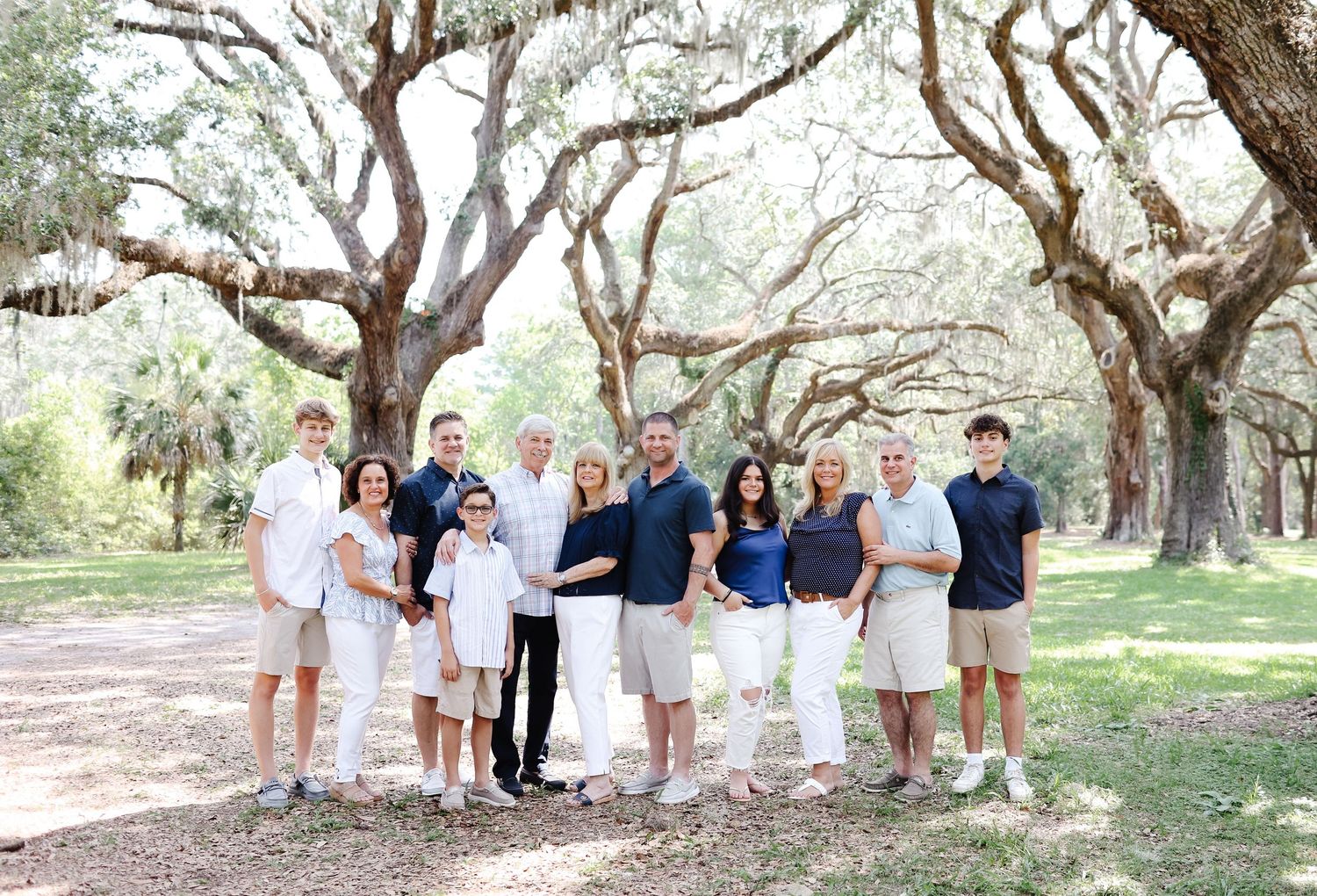 Extended family photography on Hilton Head Island with a large family portrait under live oak trees in Sea Pines