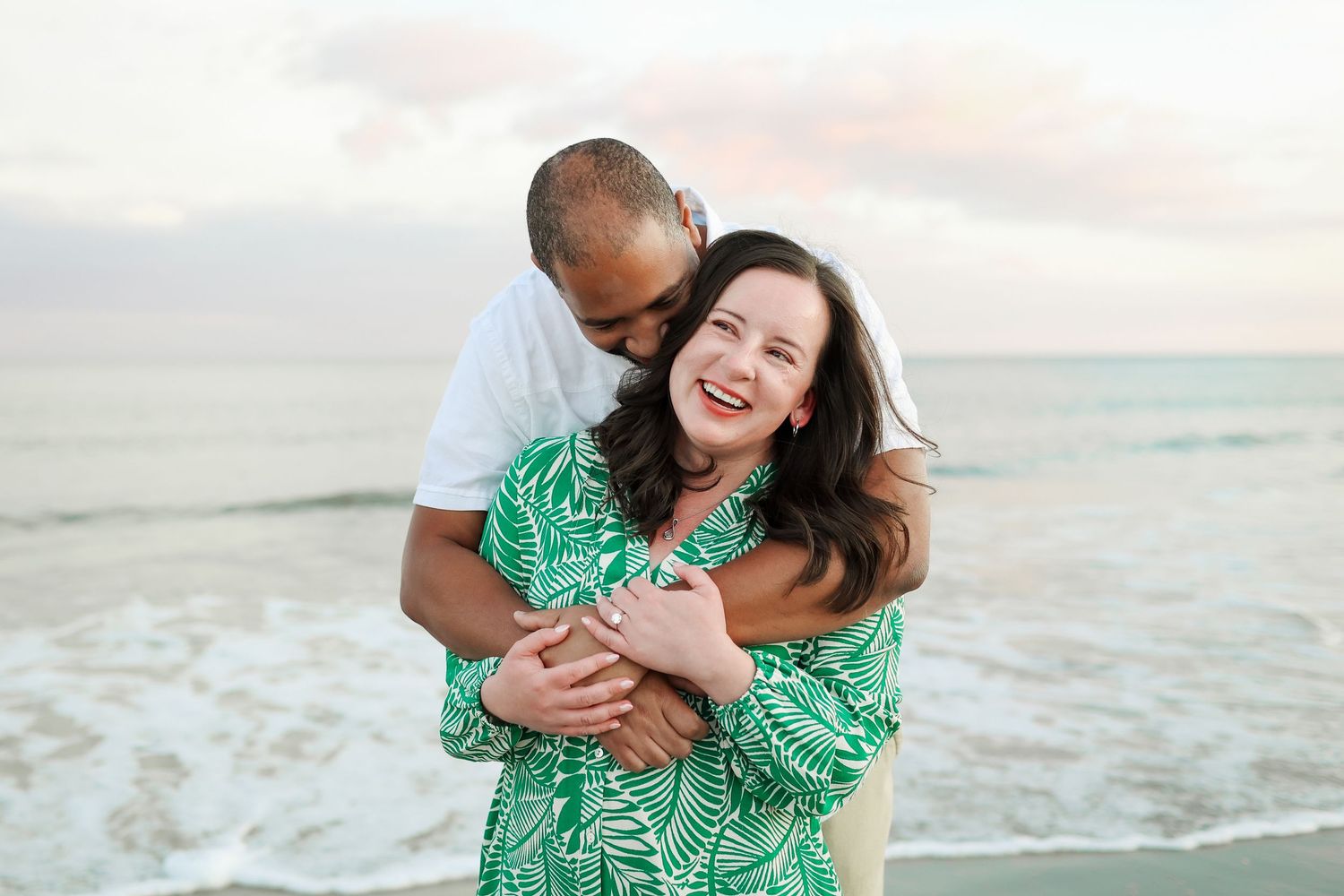 Engagement photography at the Westin Hilton Head Island, couple posing after surprise proposal at sunset