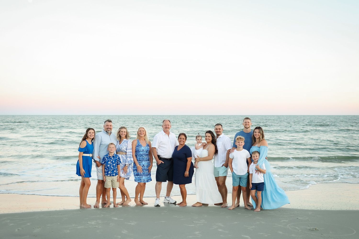 Extended family reunion photos on Hilton Head Island, large family posing together on the beach in natural light
