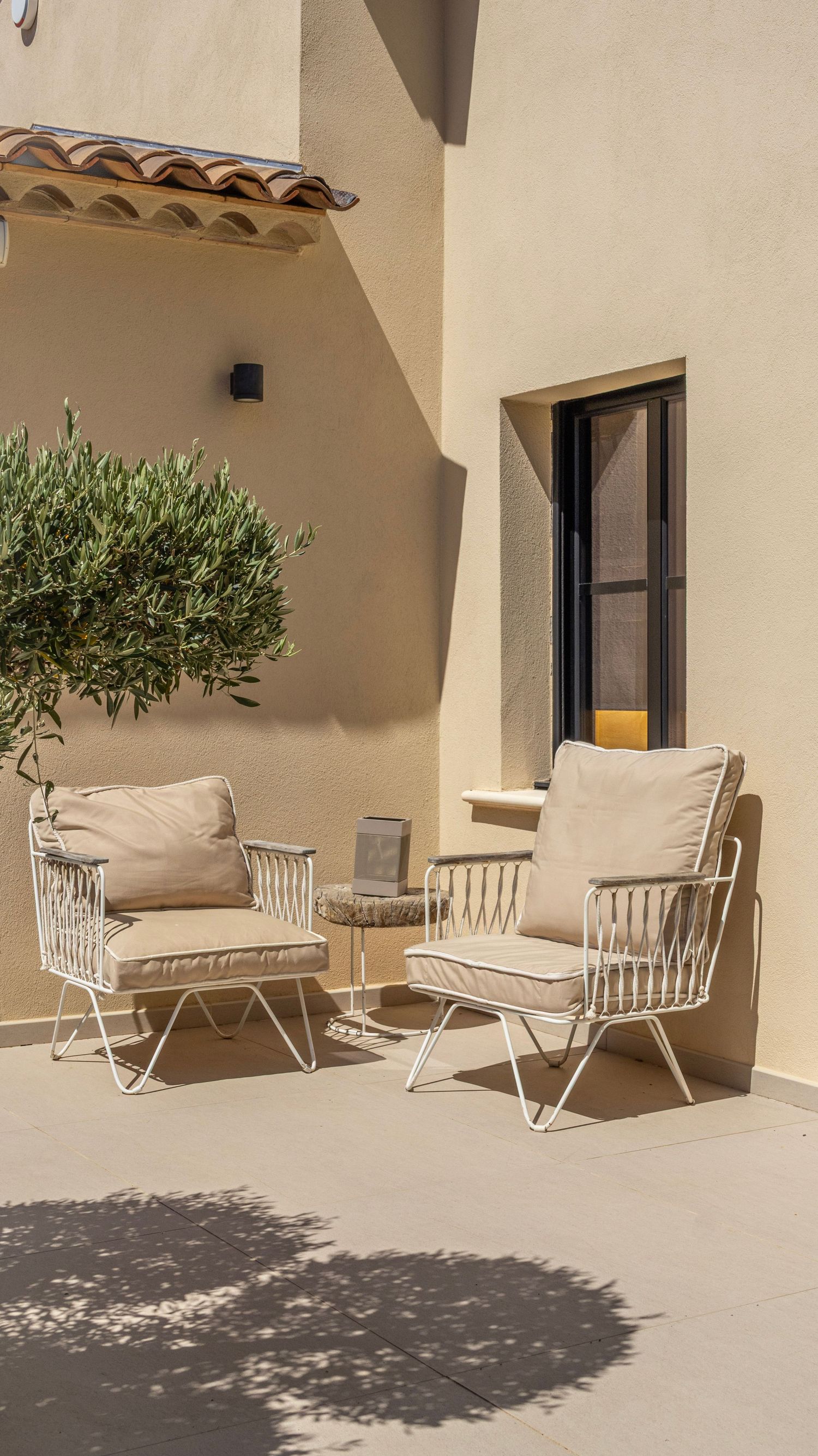 sitting in the sun - two chairs