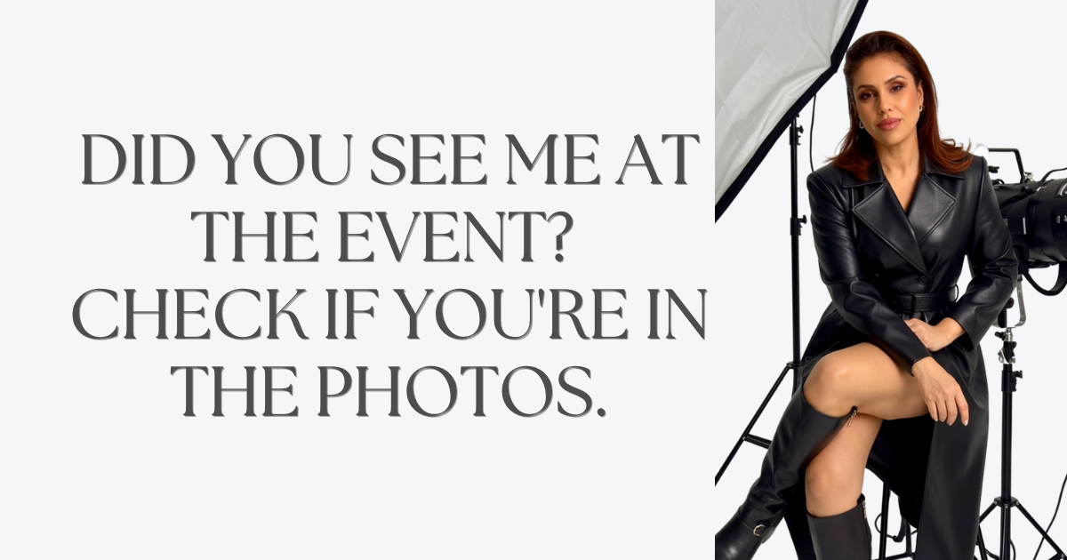 A woman in a black leather outfit sits confidently on a chair beside professional studio lighting equipment.