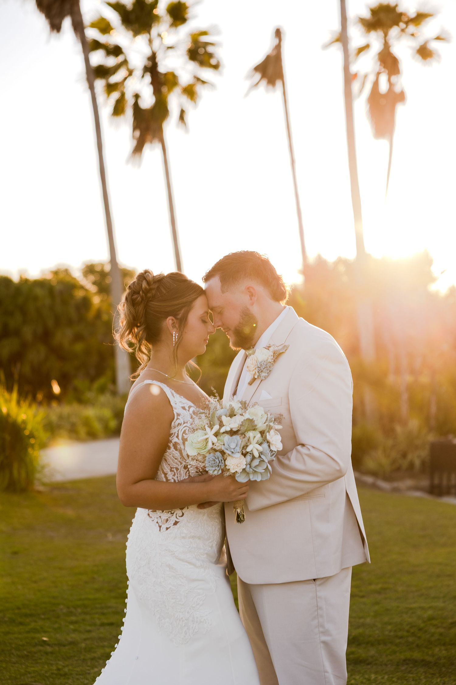 Romantic bride and groom during sunset  in St. Petersburg FL wedding photographer Grand Photo