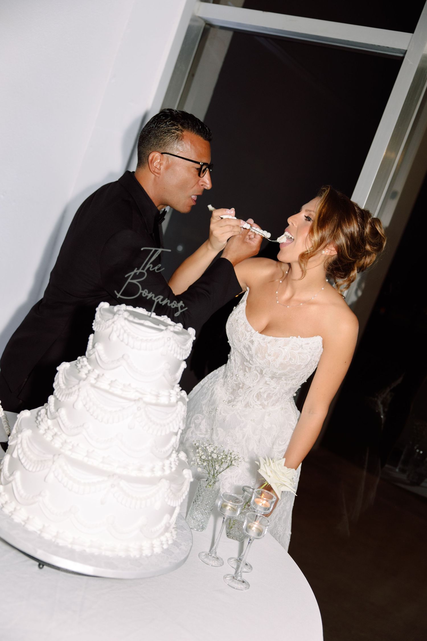 Bride and Groom cut the cake at Tampa Garden Club, Florida, captured by Grand Photo by Karyna Oliinyk