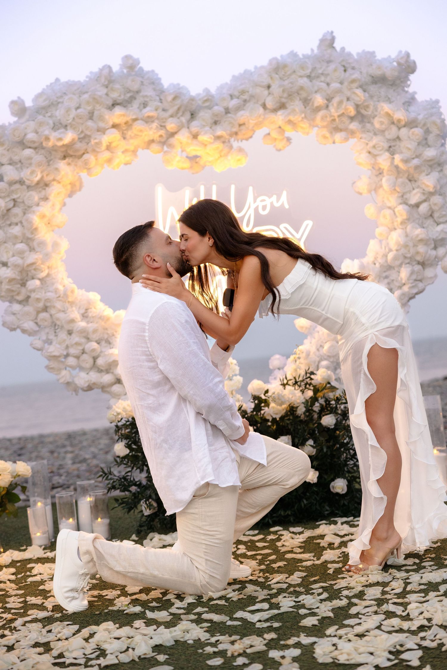 Surprise proposal session with a white heart arch in Boston Massachusetts, captured by Grand Photo, Karyna Oliinyk