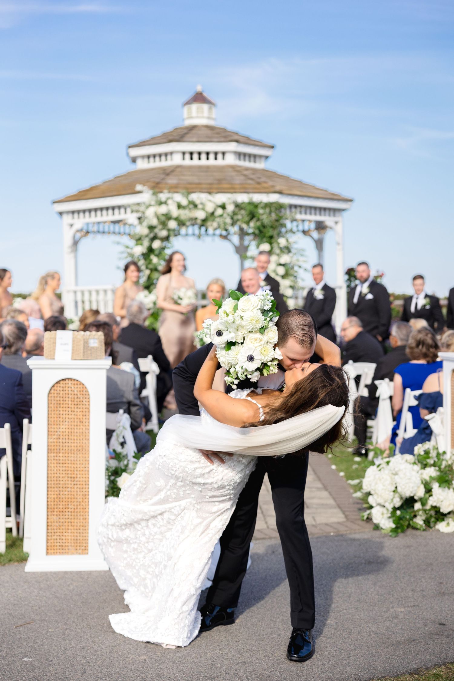 Outdoor wedding ceremony at The Chanler at Cliff Walk in Newport, Rhode Island, captured by Grand Photo by Karyna Oliinyk