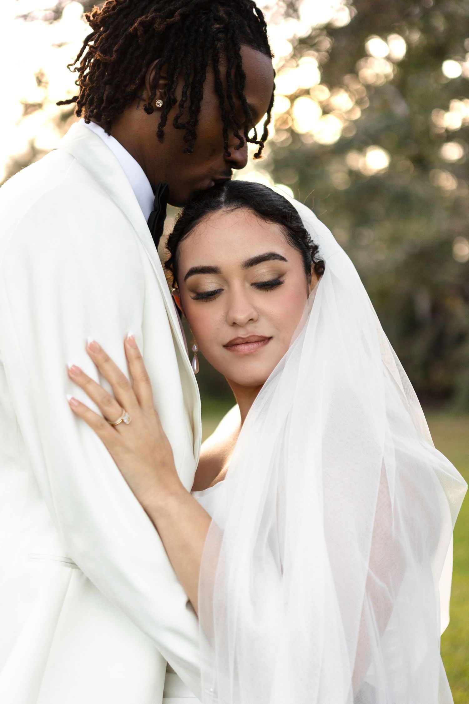 International bride and groom portraits at Harborside Chapel in Safety Harbor, Florida — wedding photographer Grand Photo, Karyna Oliinyk