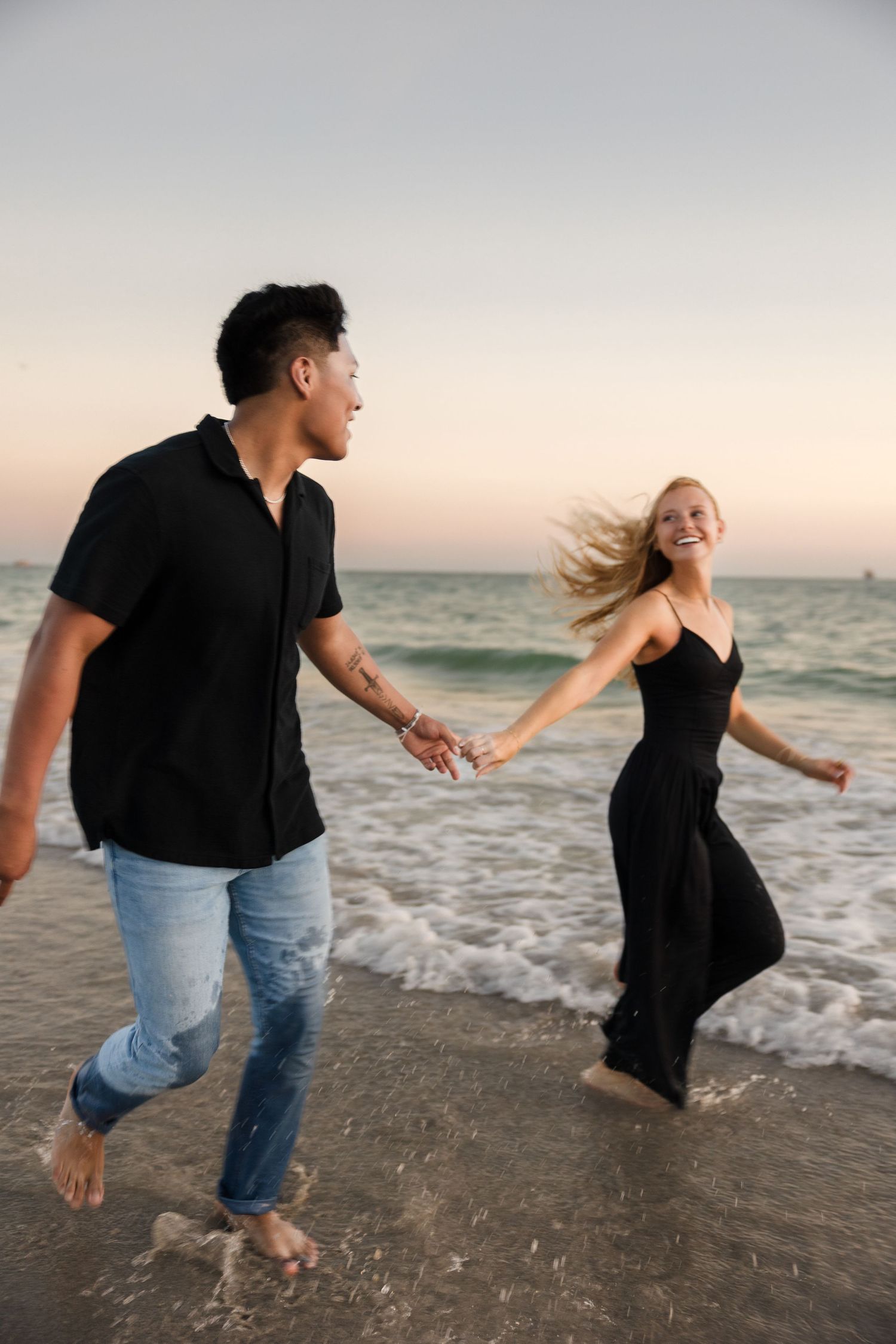 Beach sunset engagement couple session at Treasure Island Florida, captured by Grand Photo Karyna Oliinyk