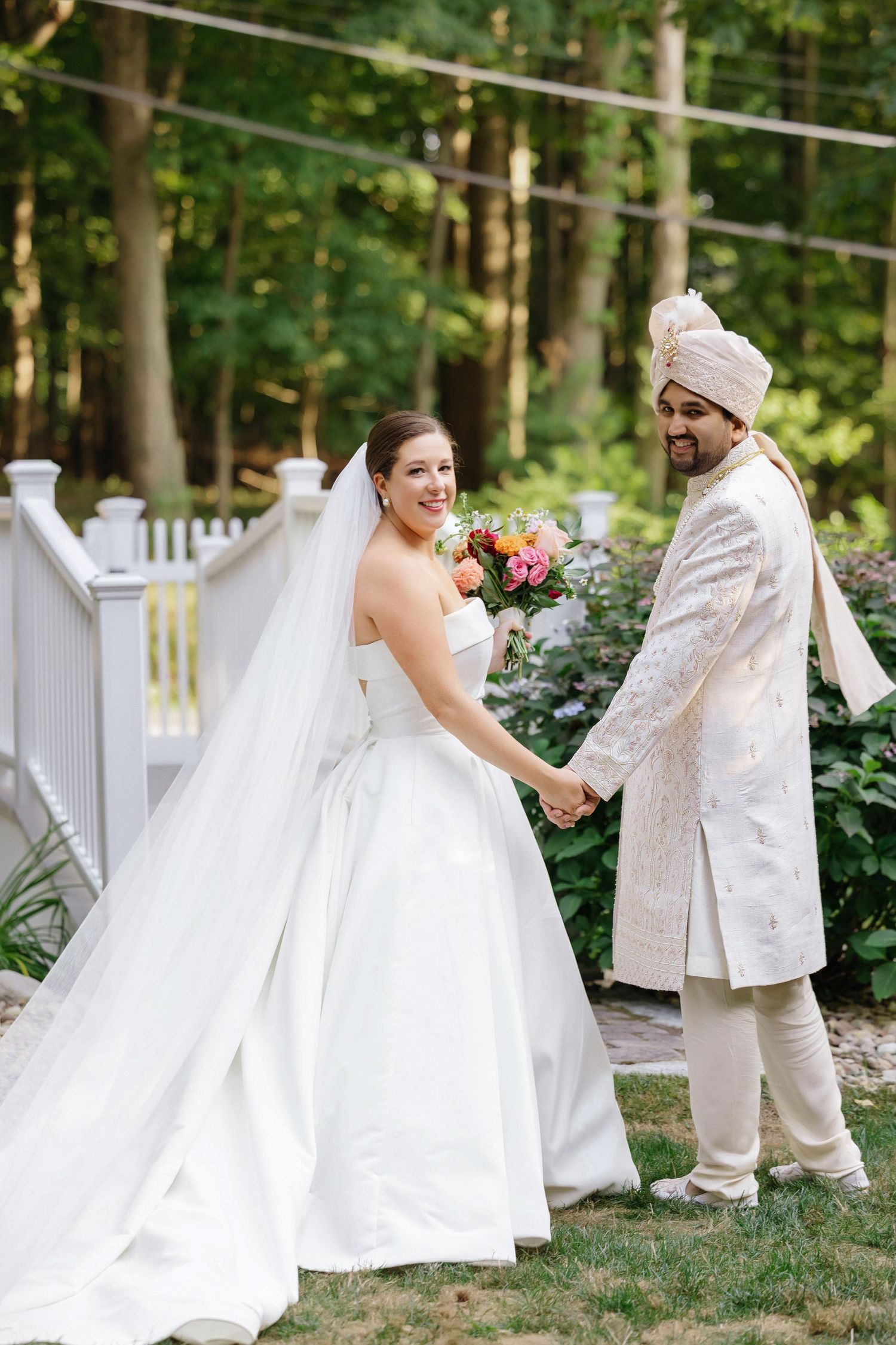 Indian couple holding hands at The Selby Gardens in Sarasota, Florida — wedding photographer Grand Photo, Karyna Oliinyk