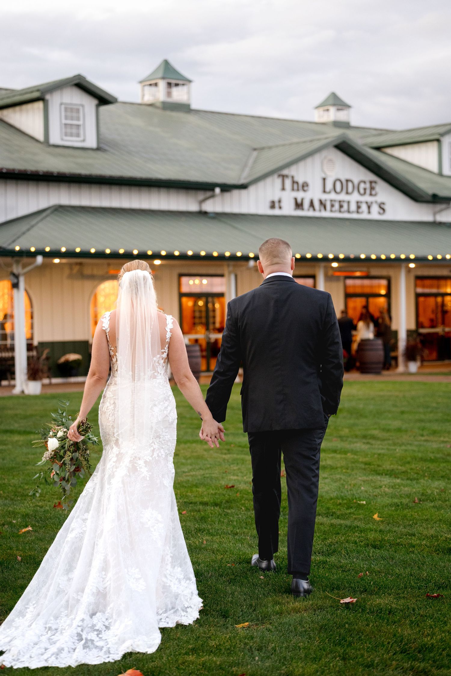 Portraits of bride and groom at Maneeley's Banquet in Windsor, Connecticut, captured by Grand Photo by Karyna Oliinyk