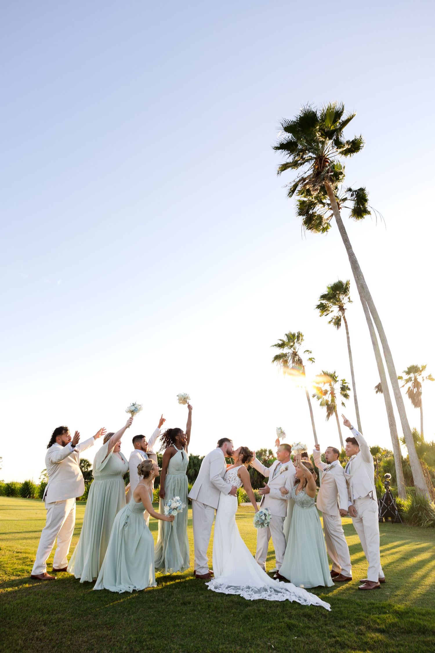 Wedding party celebrating wedding at Heron Creek Golf & Country Club in North Port, Florida, captured by Grand Photo by Karyna Oliinyk